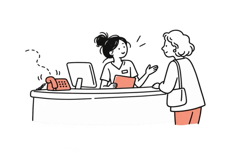 A desk phone ringing while the receptionist helps a patient at the counter